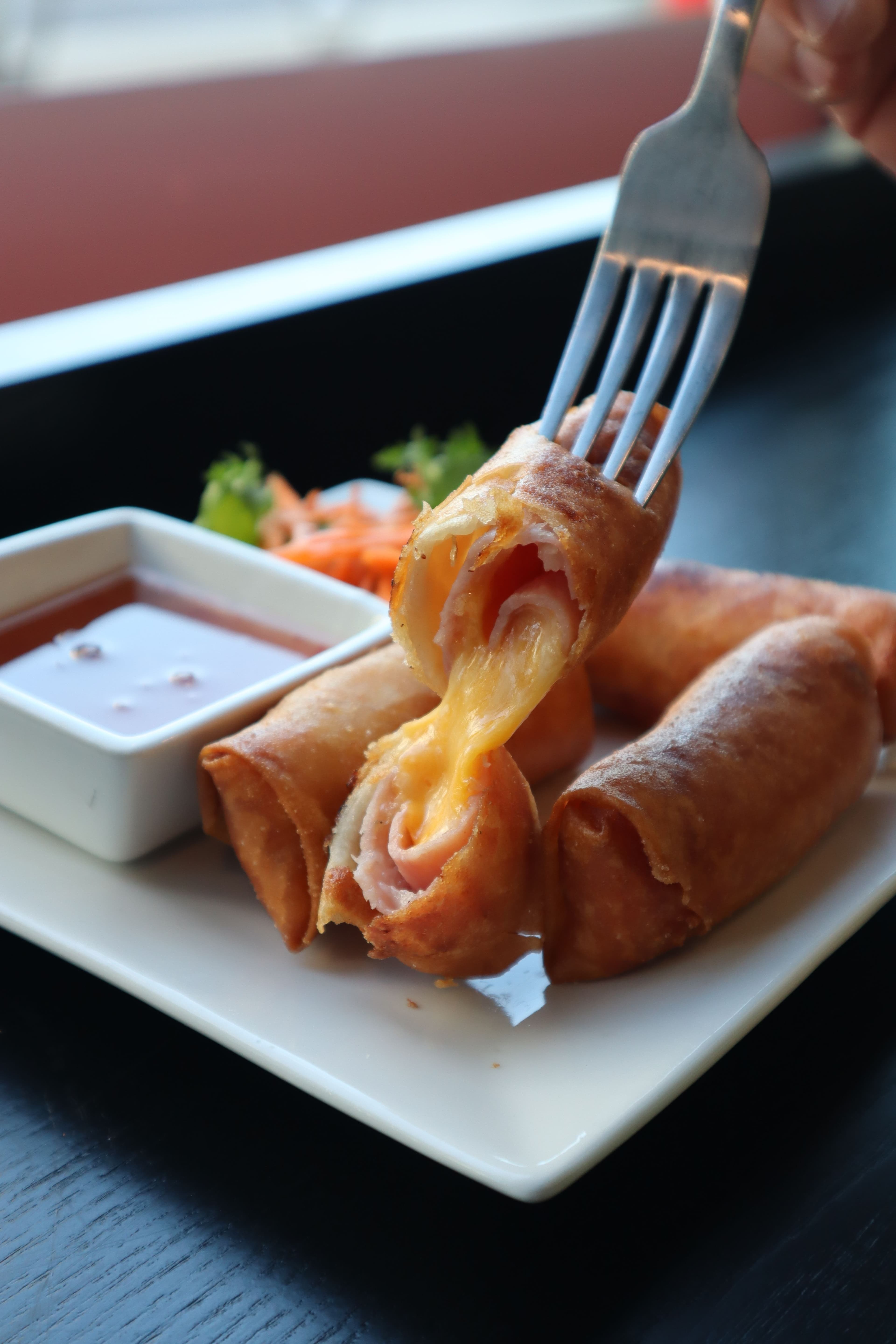 Ham and cheese spring rolls with dipping sauce
